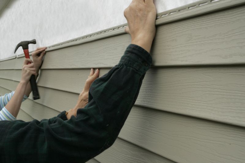 Attaching Siding Panels
